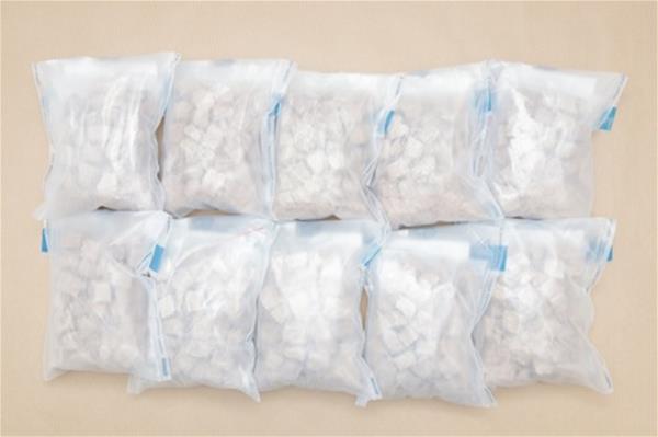 Bundles of heroin seized from a Malaysia-registered car at Woodlands Checkpoint on 5 August 2023